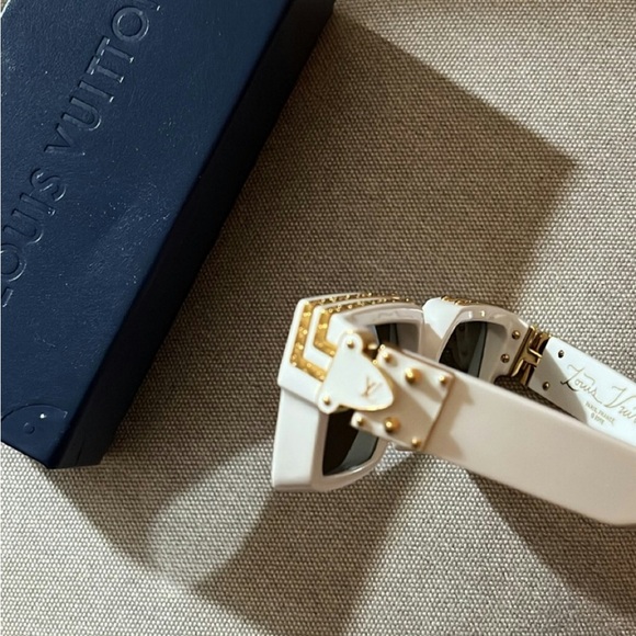 Louis Vuitton 1.1 Millionaires Sunglasses

$895.00 + tax unisex, good condition - Picture 6 of 6